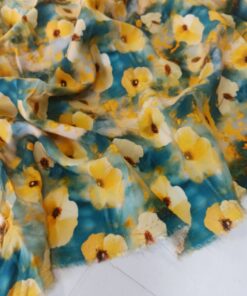Вискоза с принтом желтых цветов на фоне морской волны купить в розницу недорого