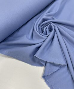 Итальянский голубой трикотаж джерси от Hugo Boss трендовые ткани купить онлайн с доставкой