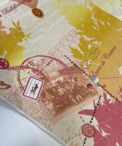 Яркий желто-красный трикотаж с принтом из Италии купить в Москве со склада недорогие ткани с доставкой