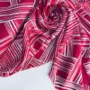 Шелковистая вискоза c красно-розовым принтом купить в Москве со склада недорогие ткани с доставкой