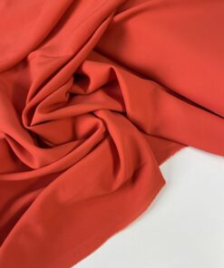 Красно-оранжевая вискоза с эластаном из Италии купить в розницу недорого