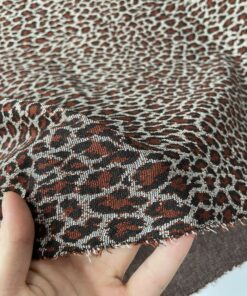 Принтованный Джерси терракотового цвета со змеиным принтом купить в розницу недорого